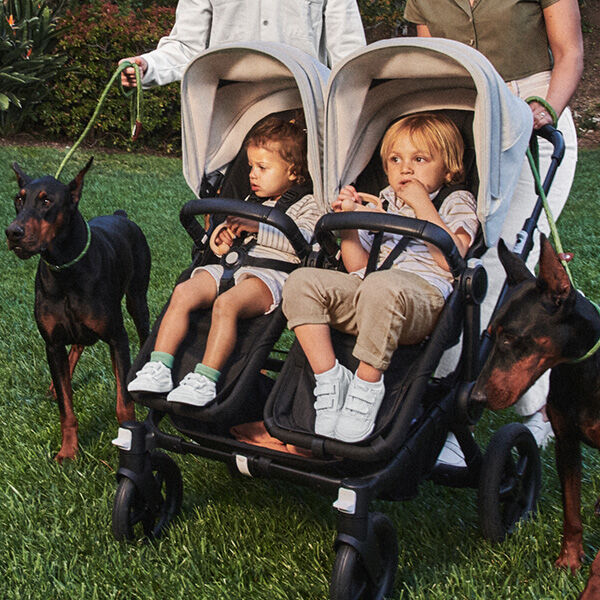 Two children in double stroller