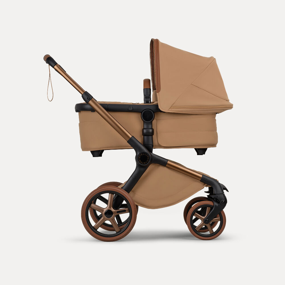 Bugaboo x Stella McCartney Fox 5 Renew all-terrain stroller in Tobacco Brown.