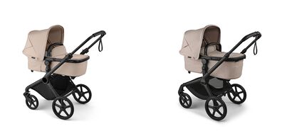 On the left, a Bugaboo Cub. On the right, a Bugaboo Fox 5 Renew. Both strollers are in Desert Taupe colorway.