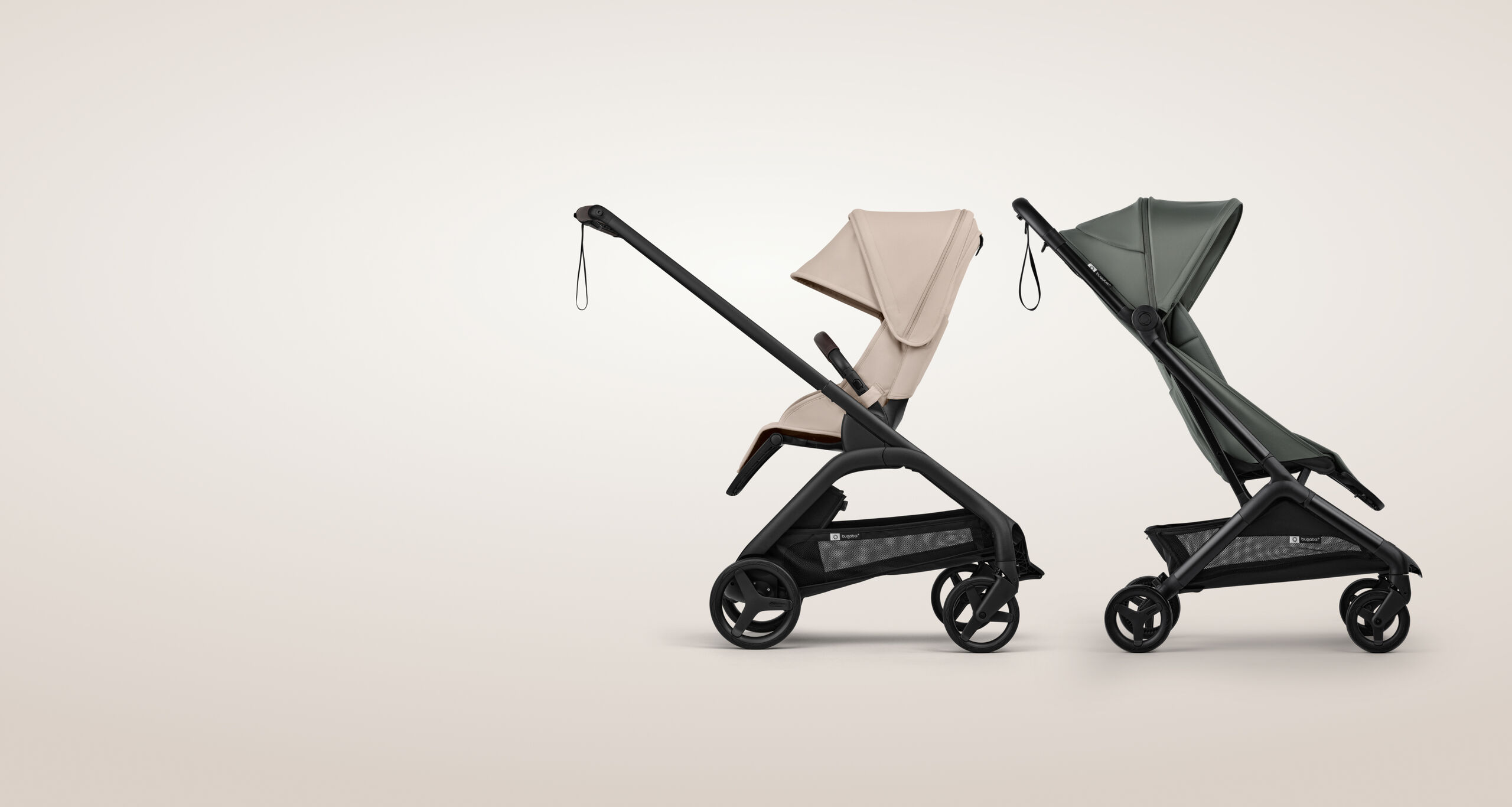 Two compact strollers in a row: Bugaboo Dragonfly Plus city stroller in Desert Taupe, and Bugaboo Butterfly 2 Plus travel stroller in Forest Green.