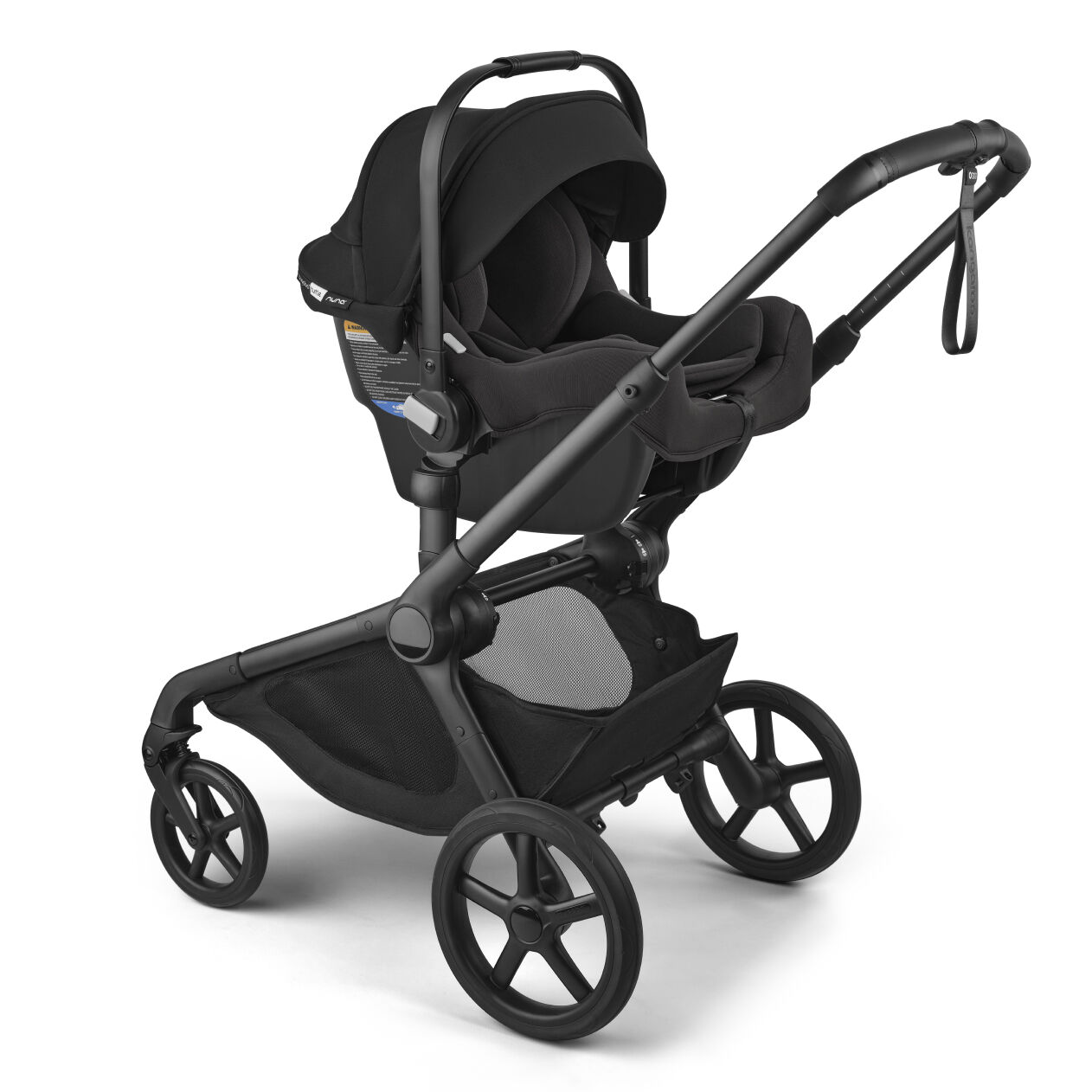 A Bugaboo Turtle by Nuna car seat attached on a Bugaboo pram.