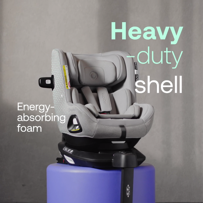 Bugaboo Owl by Nuna car seat on a pedestal. The text reads: Heavy-duty shell and energy-absorbing foam.