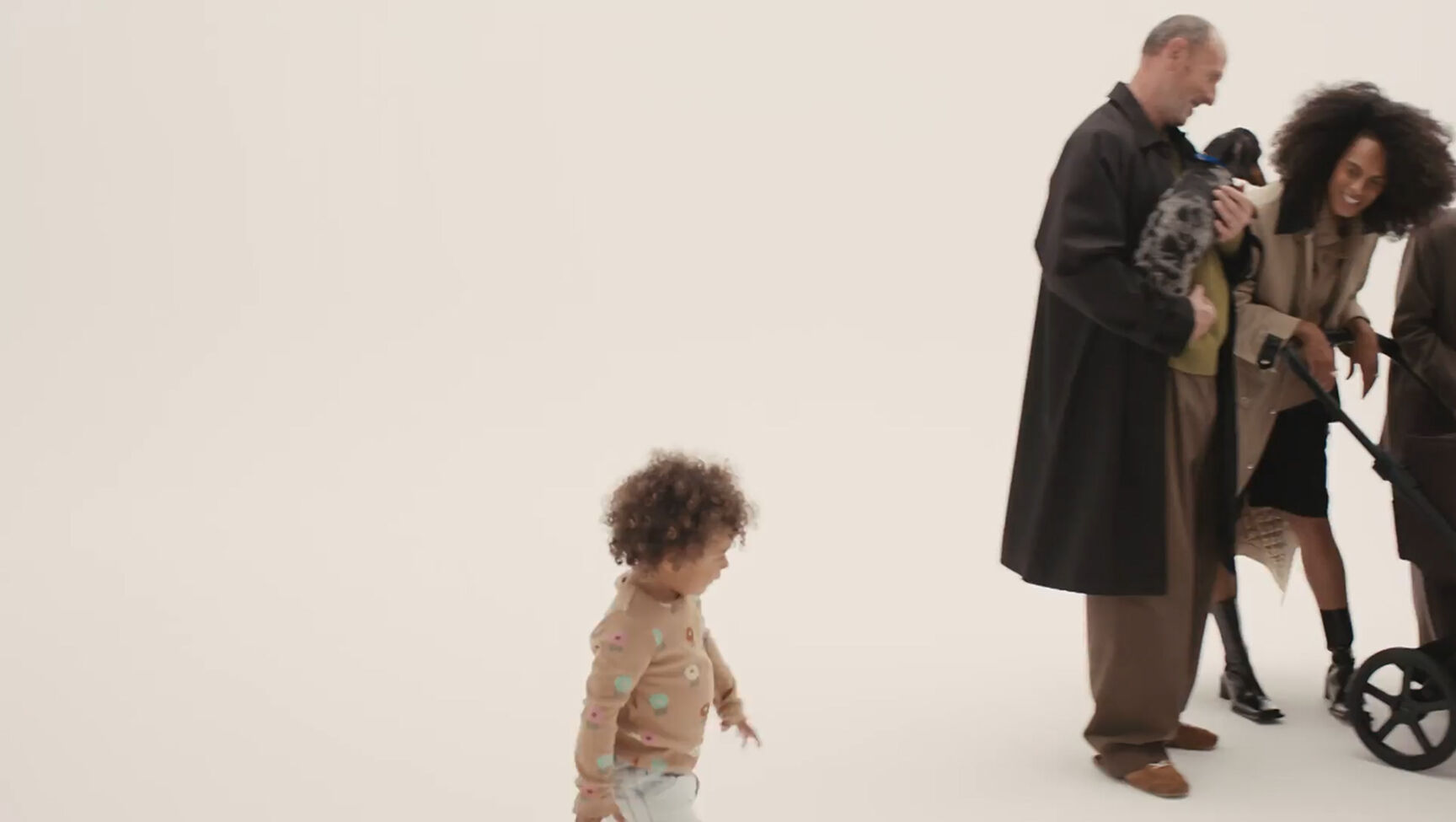 A continuous one-shot video moving through multiple scenes of families of different shapes and sizes, each featuring a Bugaboo Donkey 6 stroller shown in various configurations.