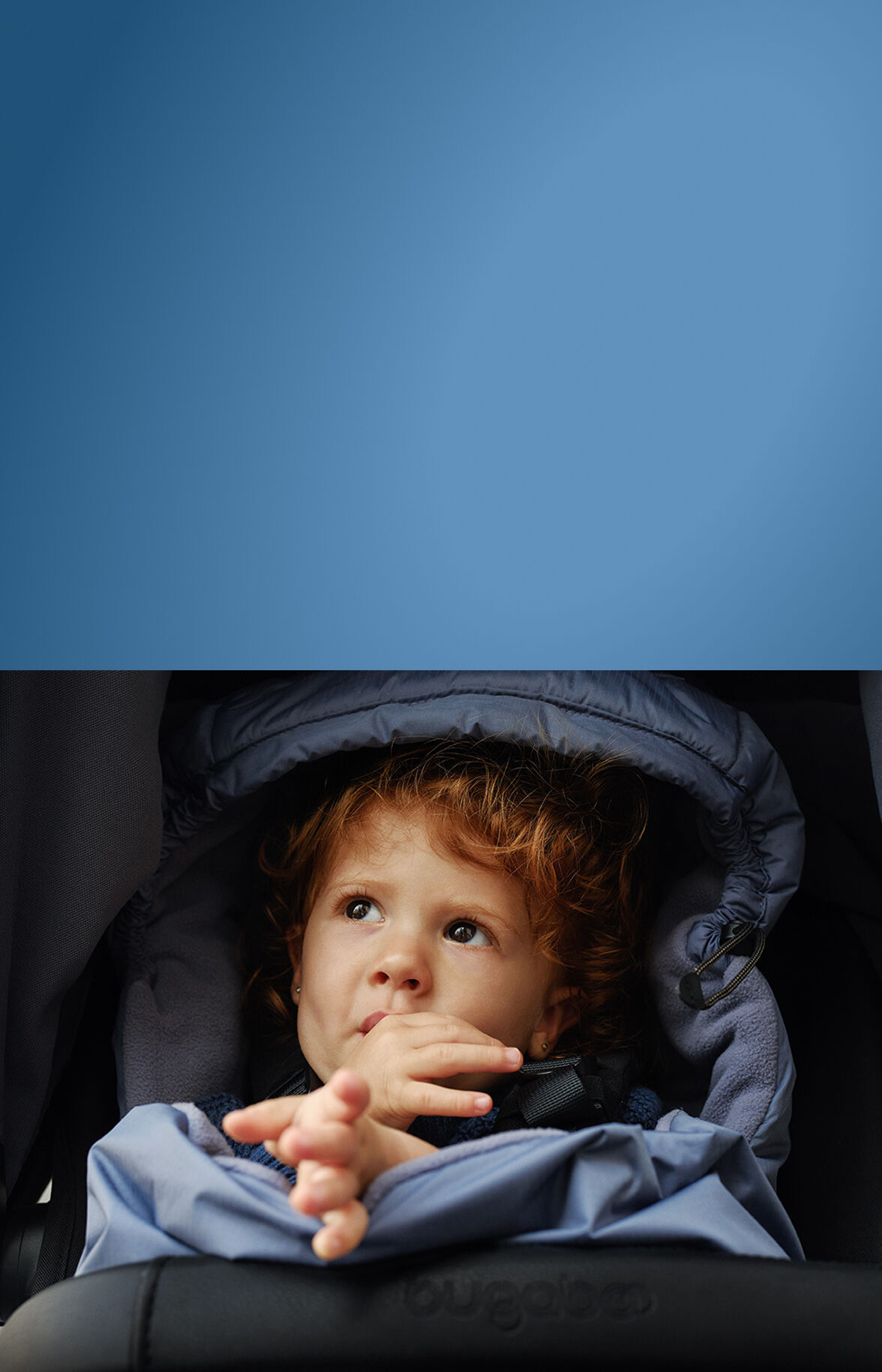 Baby in Bugaboo footmuff