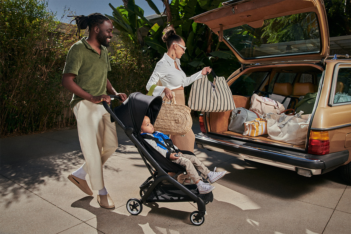 Couple pushing stroller