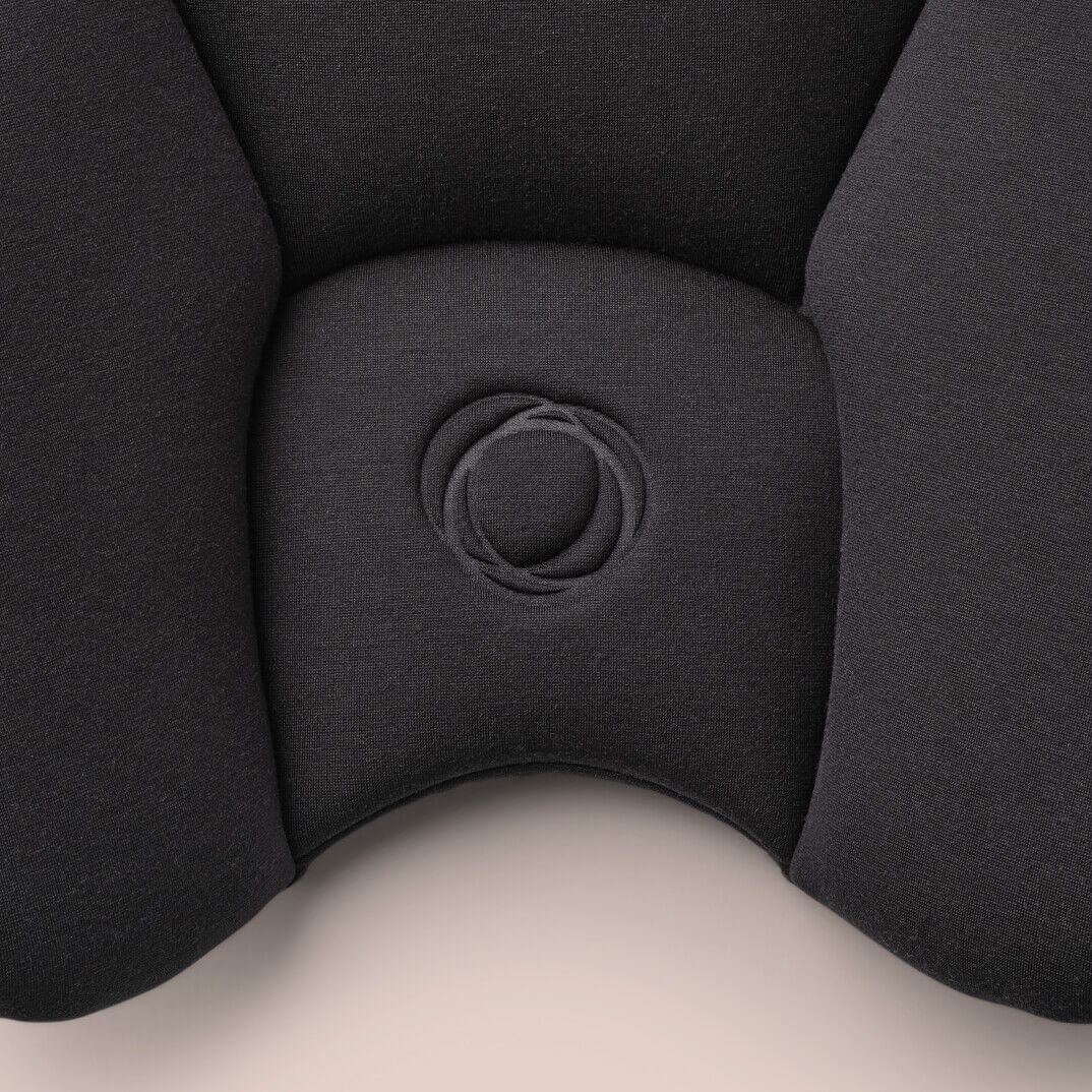 A close-up of the padded fabric material of the Bugaboo Turtle Air Shield by Nuna car seat.