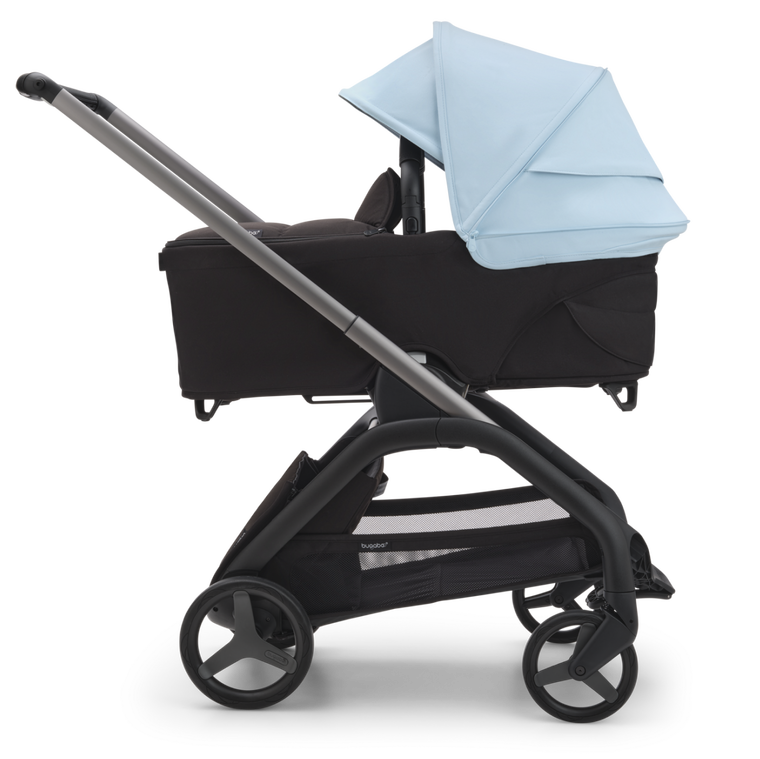 Bugaboo Dragonfly stroller with bassinet and Skyline blue sun canopy.