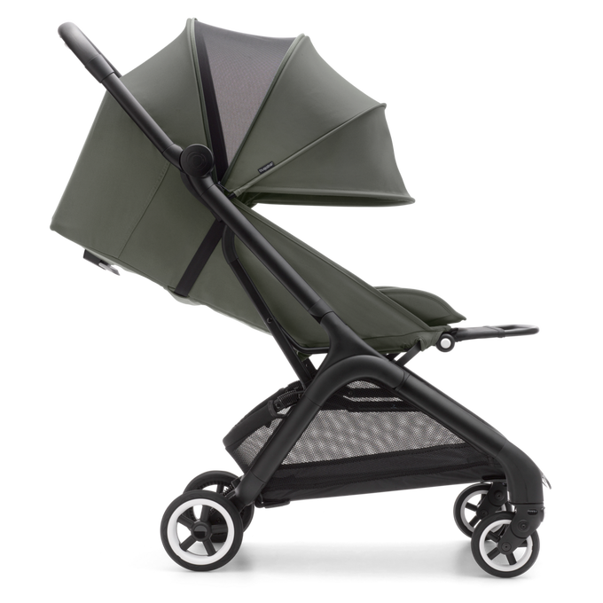 Sideway view of a Bugaboo Butterfly compact travel pram with a Forest Green canopy fully extended.