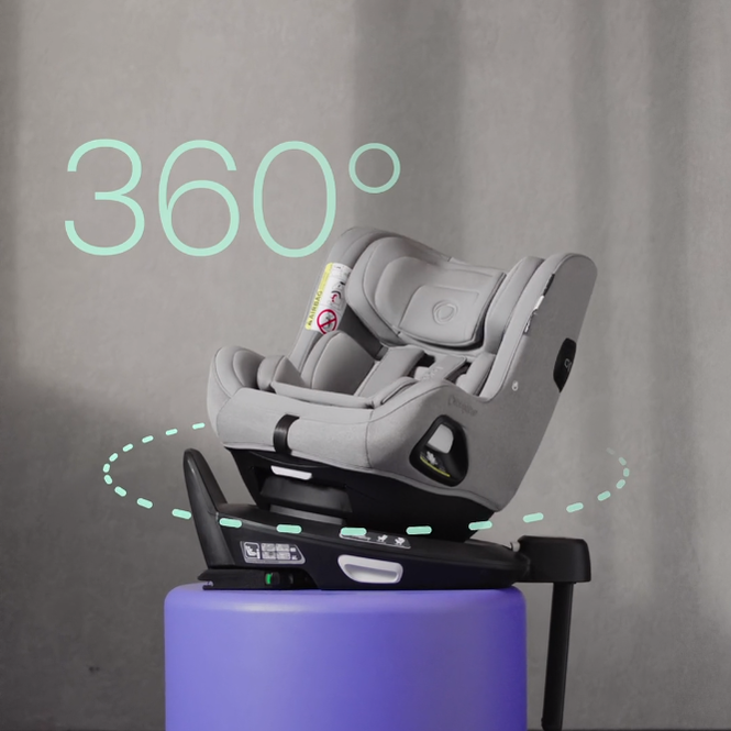 Bugaboo Owl by Nuna car seat on a pedestal with graphics showing the 360-degree swivel feature.