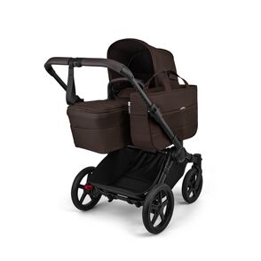 A Bugaboo Donkey 6 stroller in single configuration, featuring a seat and a side bag. The fabrics are in Cocoa Brown.