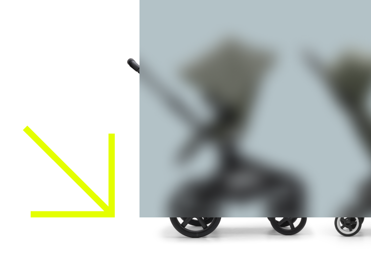 An image with Black Friday in white text over a gray background, with a vibrant yellow arrow pointing down to the text. The text sits on the right, and on the left, there’s a Bugaboo Fox 5 stroller, partially hidden behind a frosted screen effect. The wheels of the stroller peek under the frosted effect.