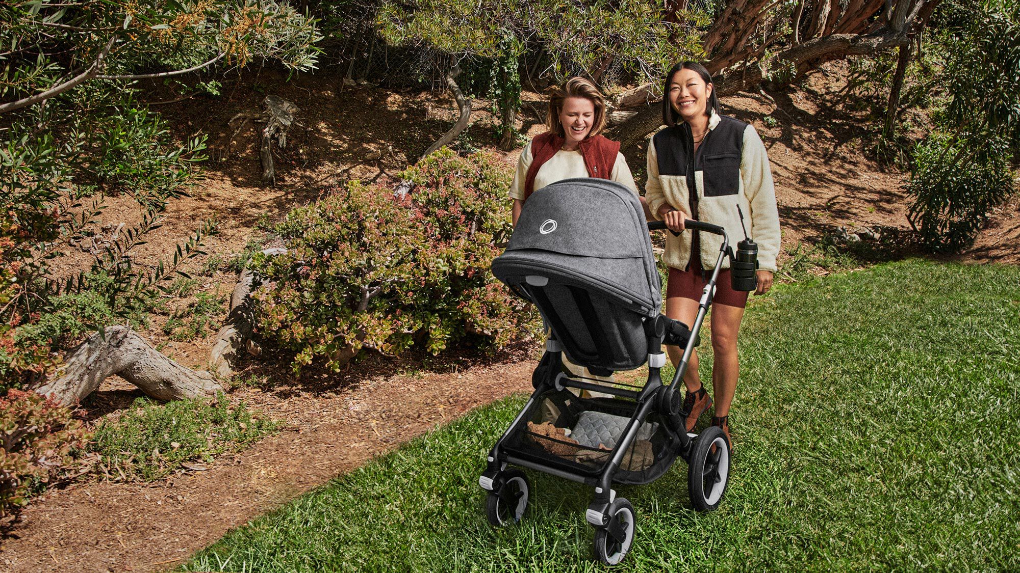 Couple on hike with baby in stroller