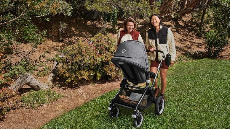 Couple on hike with baby in stoller