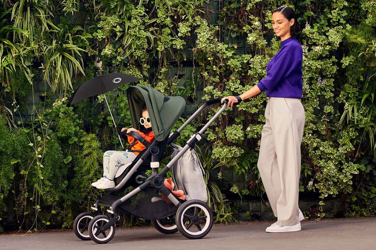 Mom pushing kid in stroller