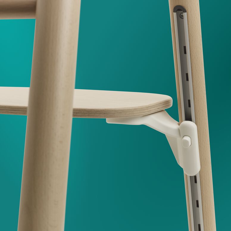 Close up on the Bugaboo quick-click adjustment system on the footrest and legs.