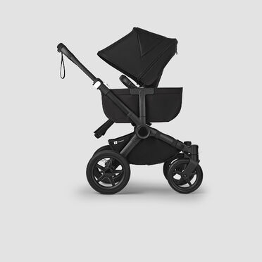 Bugaboo Donkey 5 stroller in single mode with a seat and a side pocket.