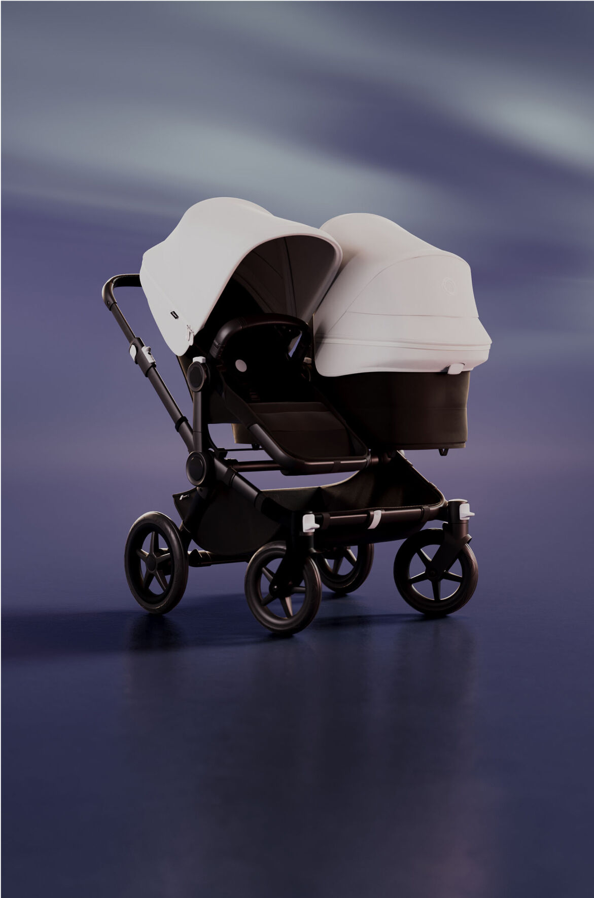 A Bugaboo Donkey 5 Duo pushchair with a seat and a bassinet. The sun canopy is in Misty White. The background is blue with streaks of white.