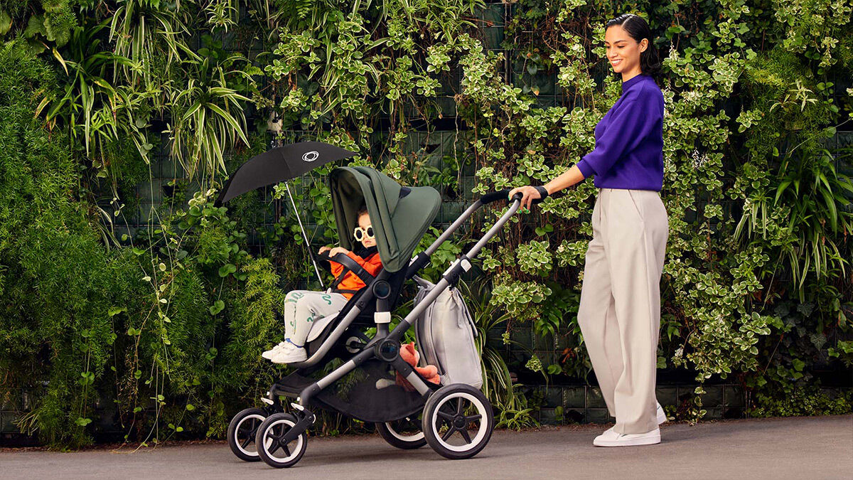 Mom pushing kid in stroller