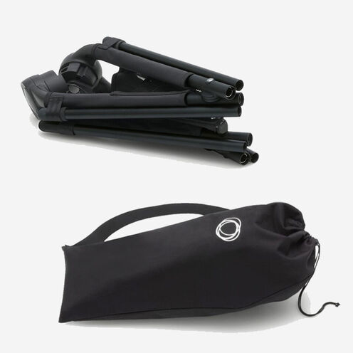 A folded Bugaboo bassinet stand, next to a carry bag with strap.