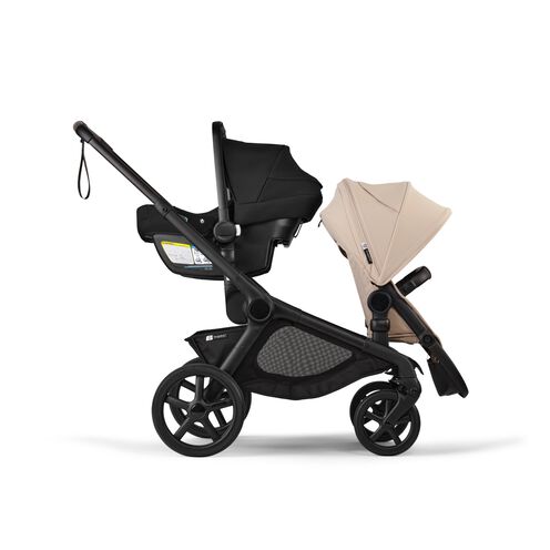 A Bugaboo Kangaroo stroller with a seat in Desert Taupe fabric and a car seat.