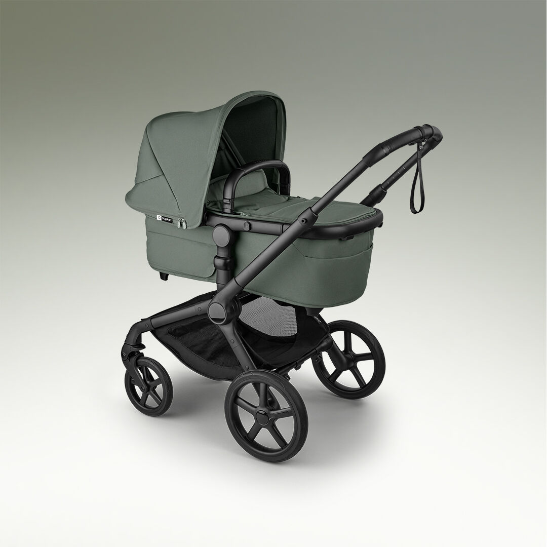 A Bugaboo Fox 5 Renew all-terrain pushchair with a bassinet.