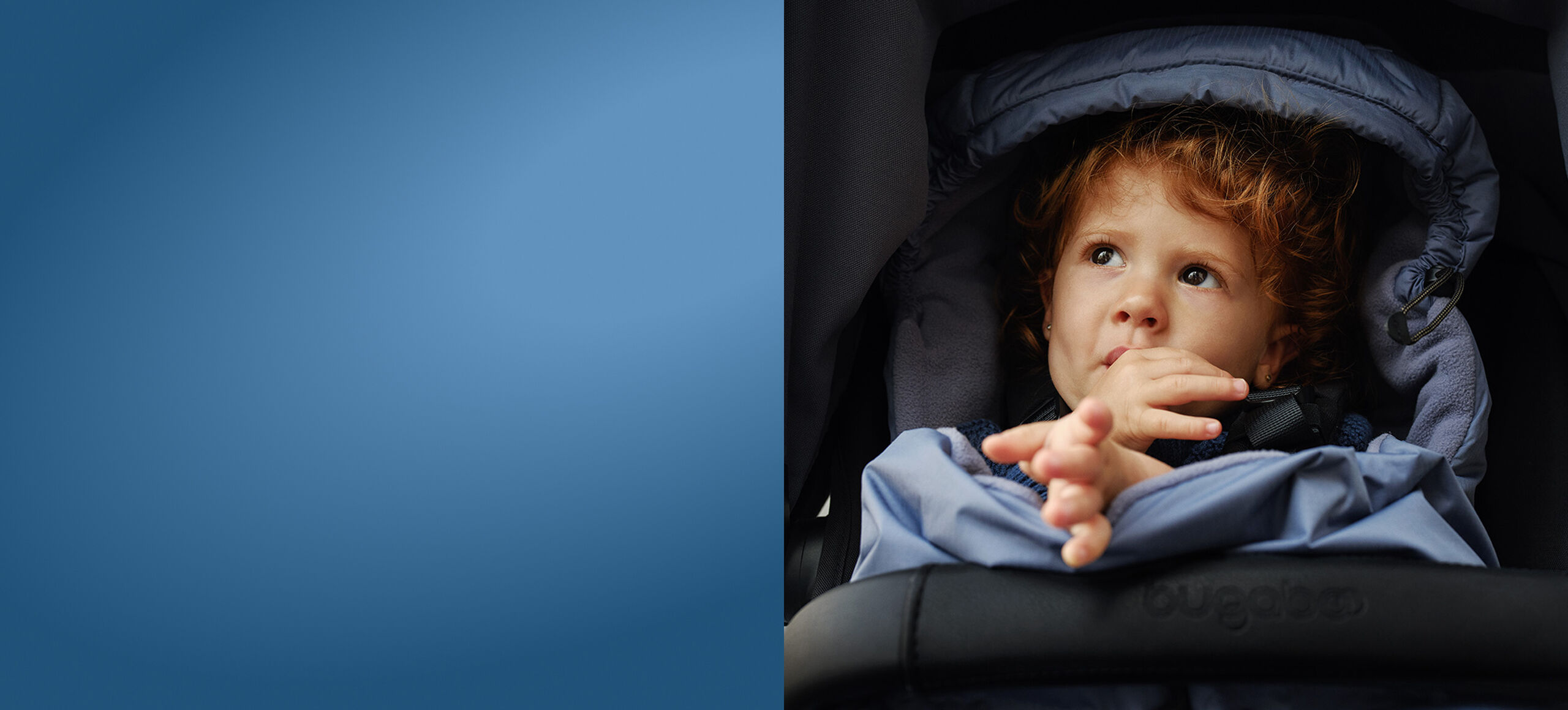 Baby in Bugaboo footmuff