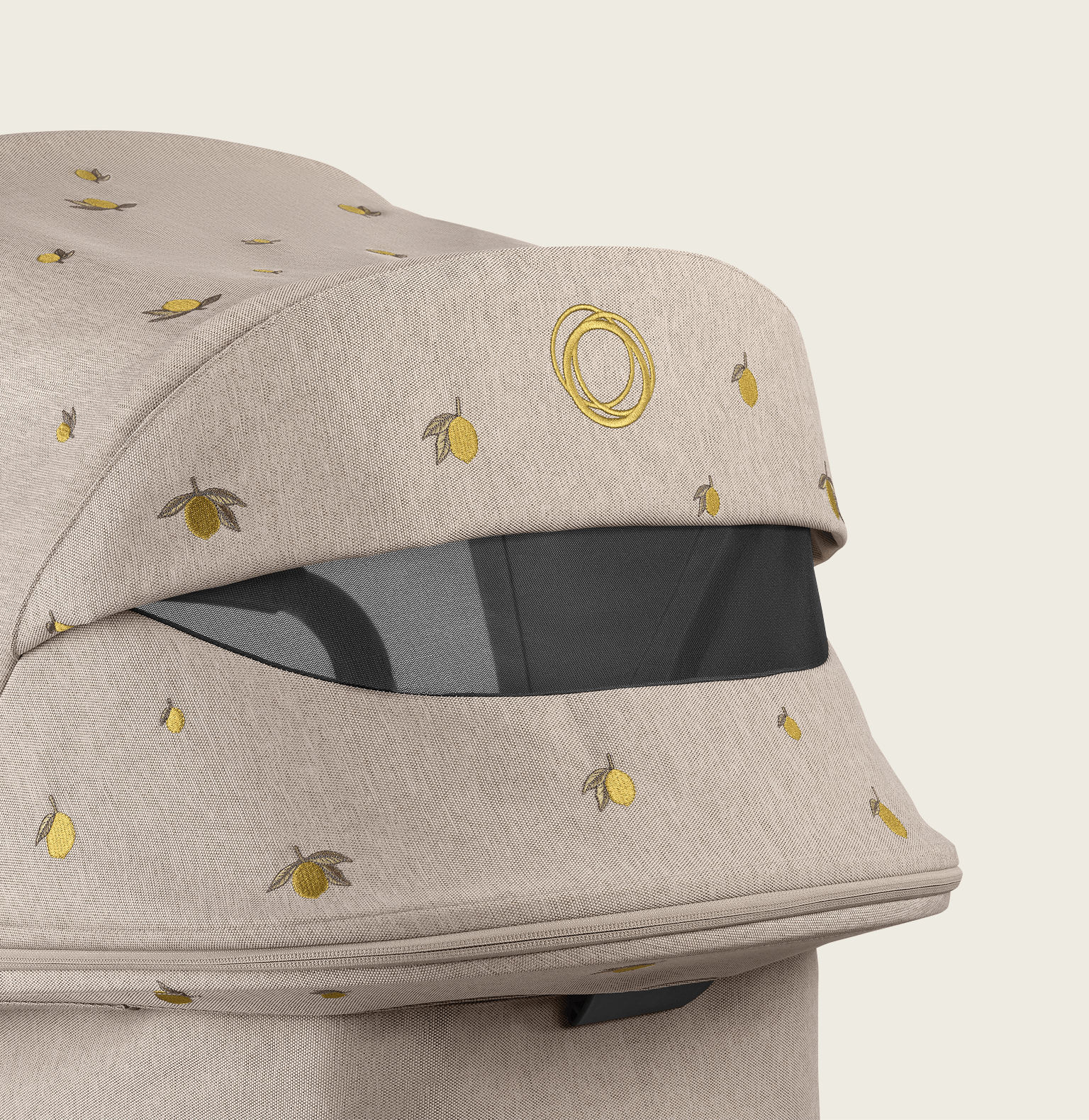 A close-up on a Bugaboo x Konges Sløjd Limited Edition sun canopy featuring Konges Sløjd lemon motif embroidery.