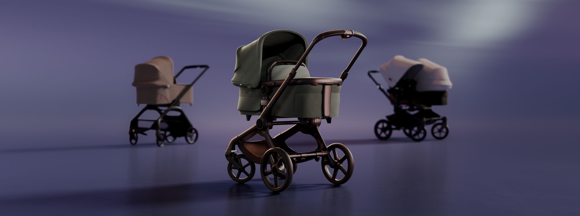 A lineup of 3 newborn prams. At the front is a Bugaboo Fox 5 with Forest Green fabrics; further back are a Bugaboo Fox 5 with Dune Taupe fabrics and a Bugaboo Donkey 5 Duo with Misty White sun canopy.