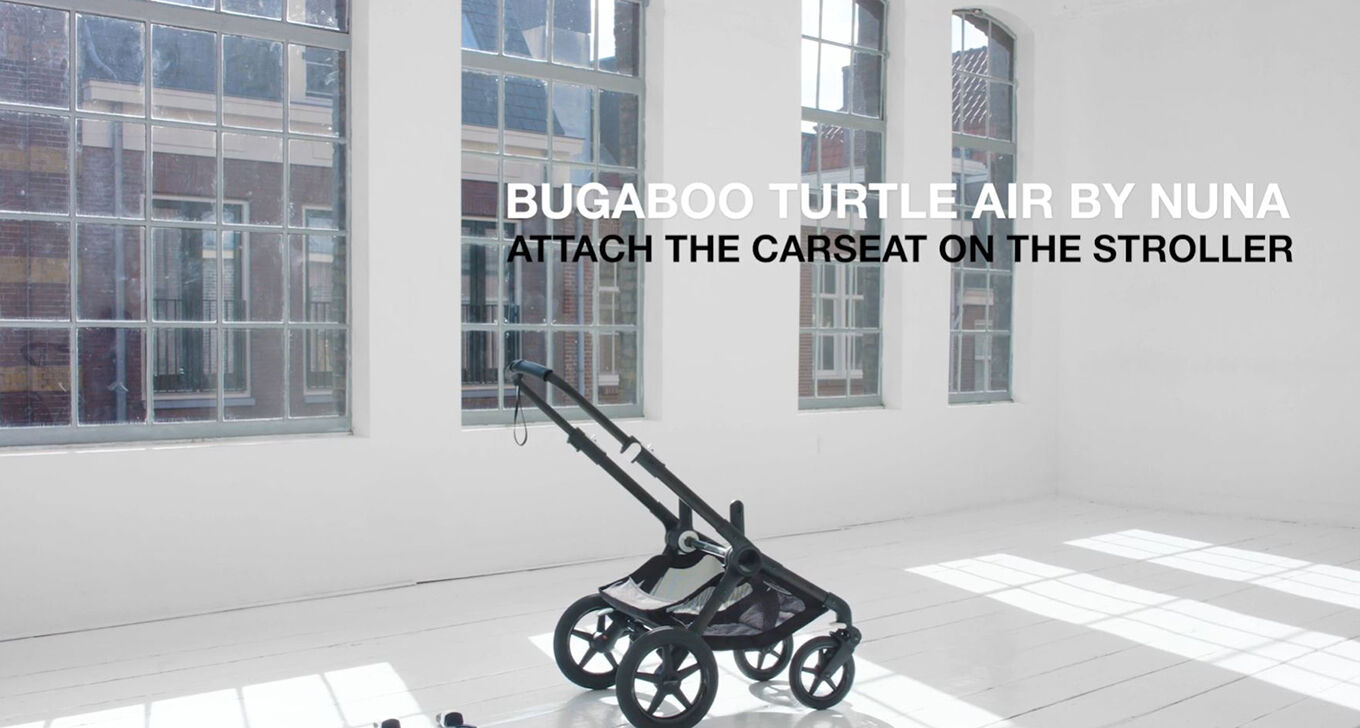 A bare Bugaboo stroller frame in a warehouse; the text reads: 