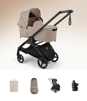 En Bugaboo Dragonfly Plus kompakt barnvagn, visas med olika babytillbehör i paketet