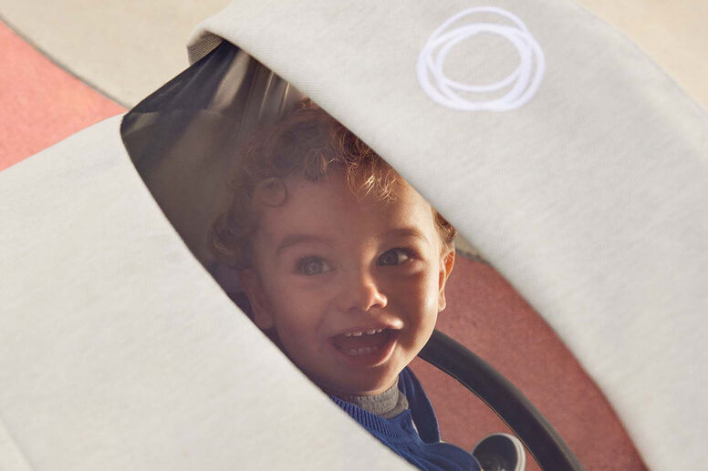 Smiling child in stroller