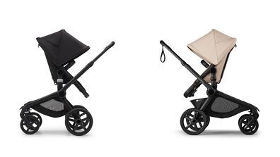 Two strollers in comparison: On the left is the Bugaboo Fox 5 in black fabrics. On the right is the Bugaboo Kangaroo in Desert Taupe fabrics.