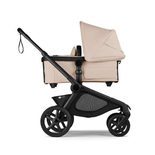 A Bugaboo Kangaroo single-to-double stroller in Desert Taupe fabrics, with a bassinet.