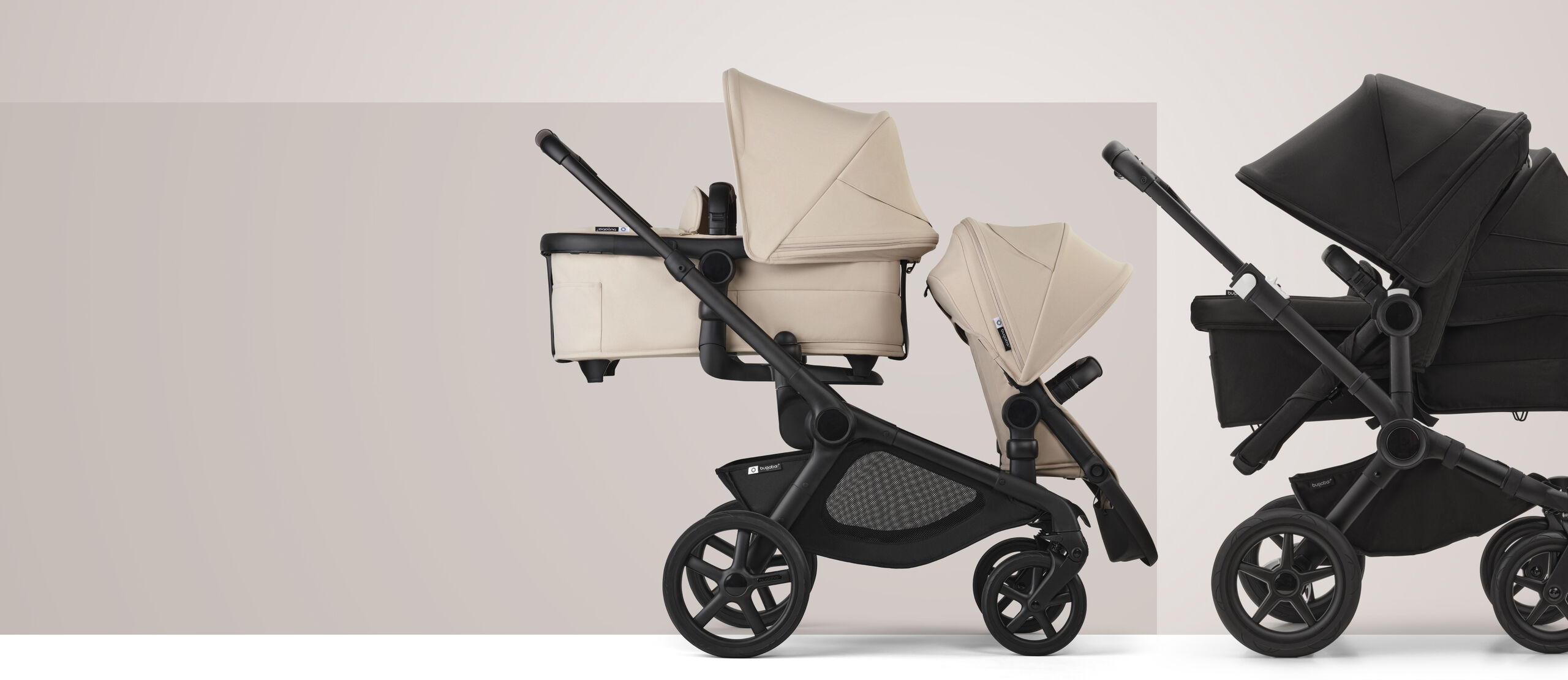 A Bugaboo Donkey 5 Duo stroller with a seat and a bassinet. The sun canopy is in Misty White. The background is blue with streaks of white.