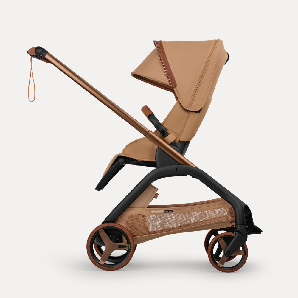 Bugaboo x Stella McCartney Dragonfly Plus city stroller in Tobacco Brown.