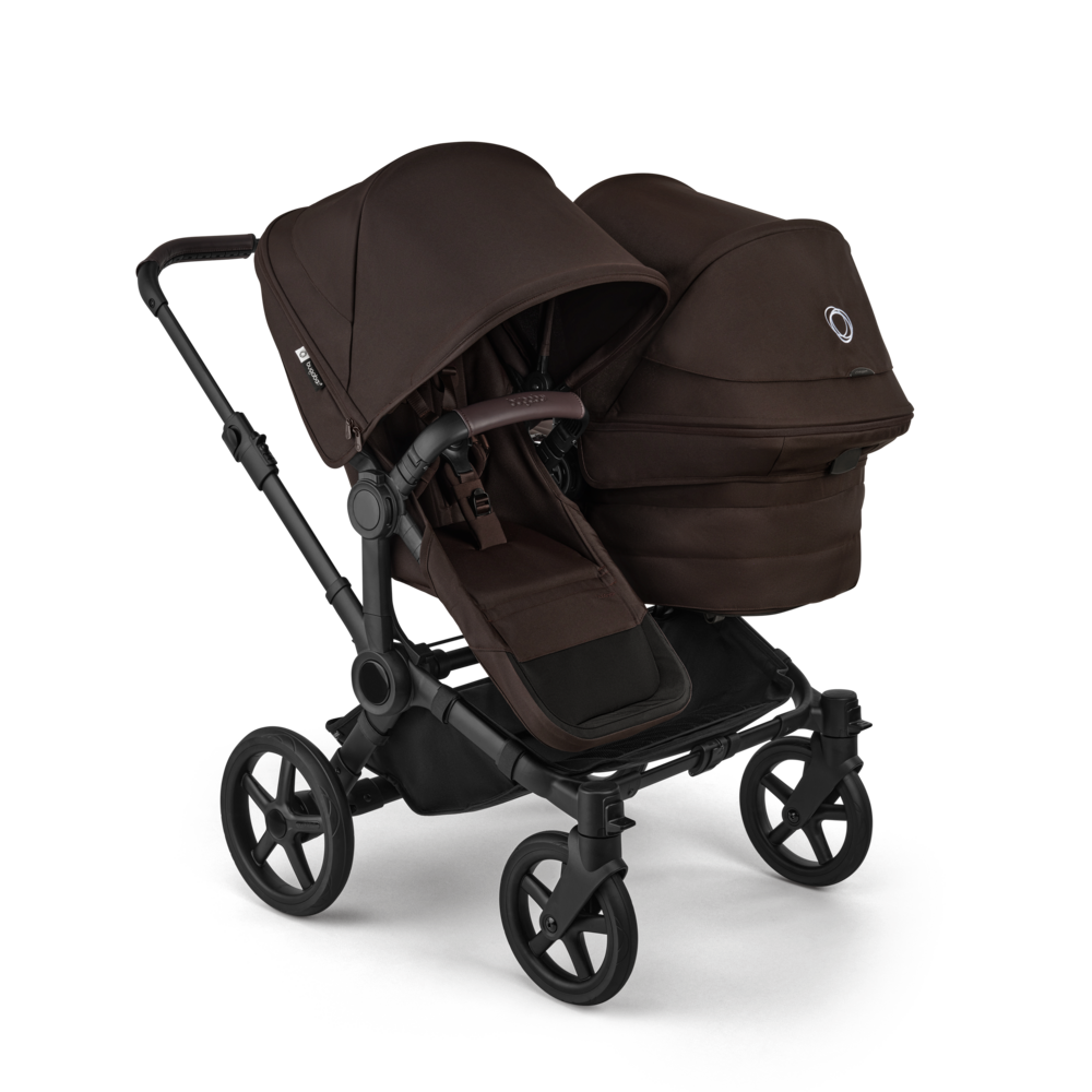 A Bugaboo Donkey 6 pram in double configuration, featuring a seat and a pram body. The fabrics are in Cocoa Brown.