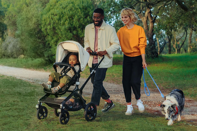 Family walking with stroller accessories