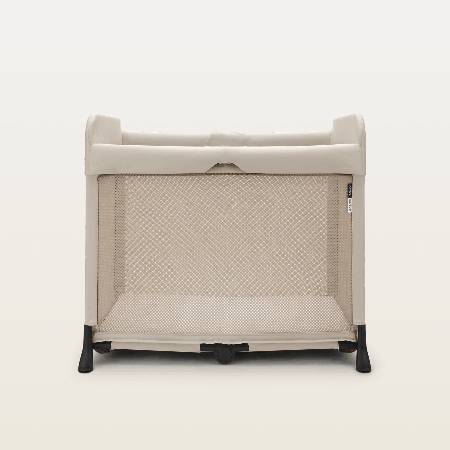 Bugaboo Stardust travel cot in taupe fabrics.
