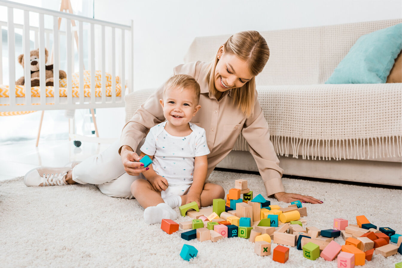 Mother and baby in gender-neutral nursery