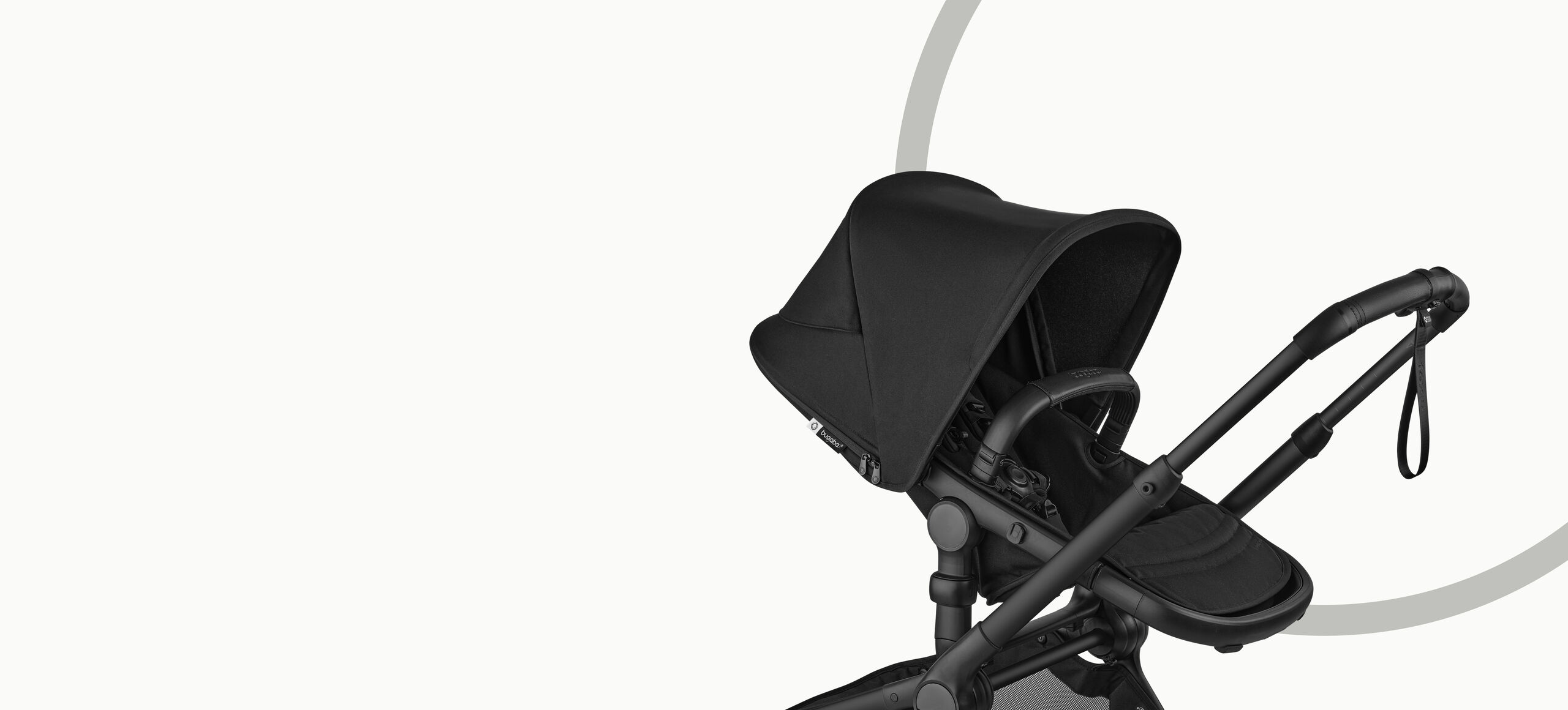 Black Bugaboo Fox 5 Renew stroller with extended canopy and black frame, shown in side view on a light gray background.