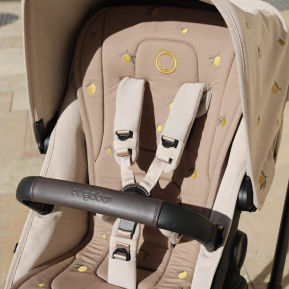 A Bugaboo stroller with Bugaboo X Konges Sløjd Limited Edition seat liner, featuring Konges Sløjd's signature lemon print.
