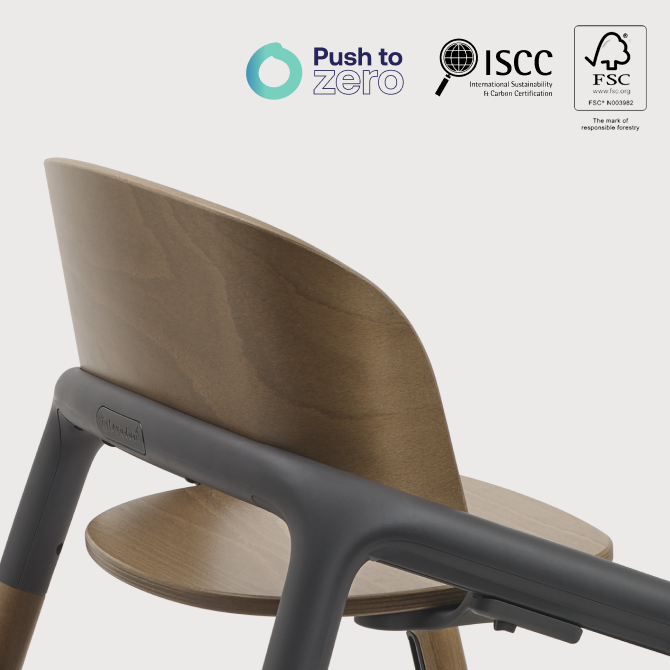 The Bugaboo Giraffe chair in close up, with several logos in top right corner: Push to Zero, ISCC and FSC.