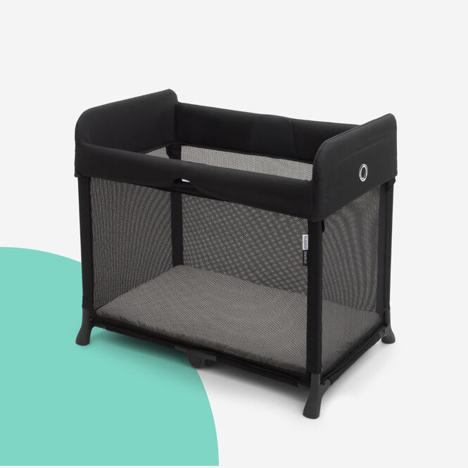 Stardust travel cot in black.