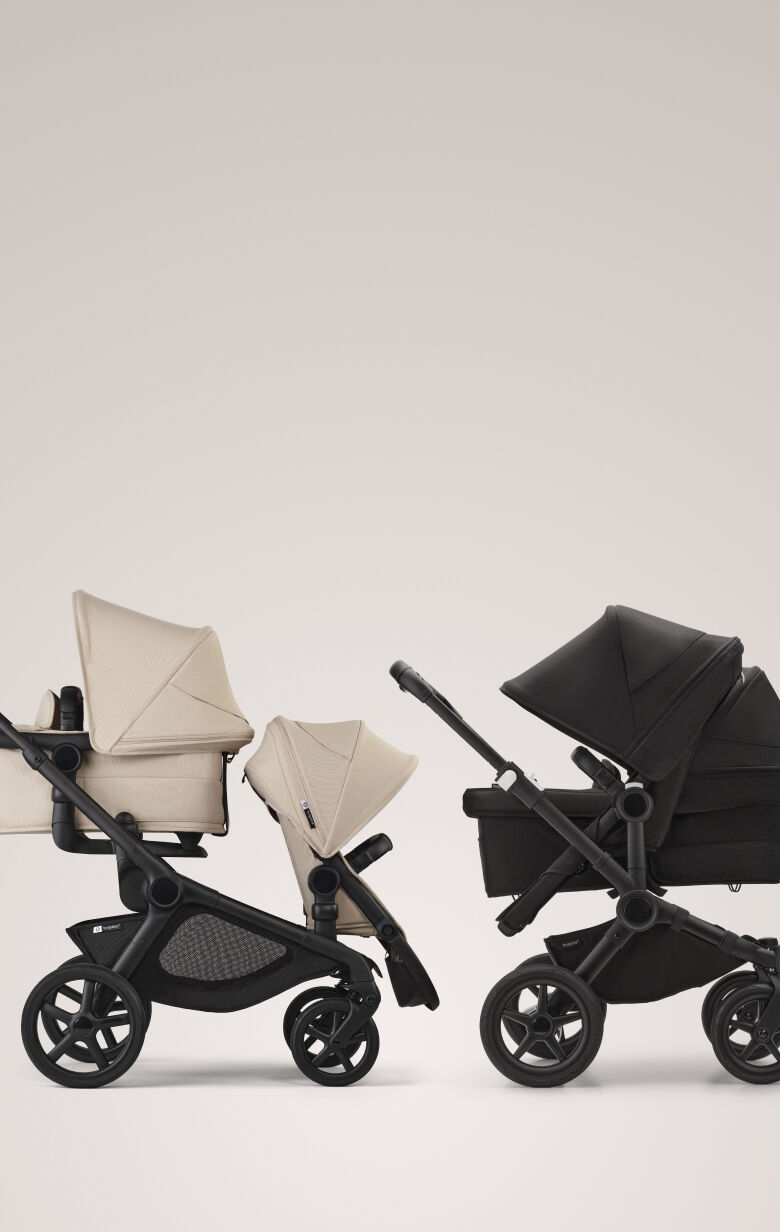 A Bugaboo Donkey 5 Duo stroller with a seat and a bassinet. The sun canopy is in Misty White. The background is blue with streaks of white.