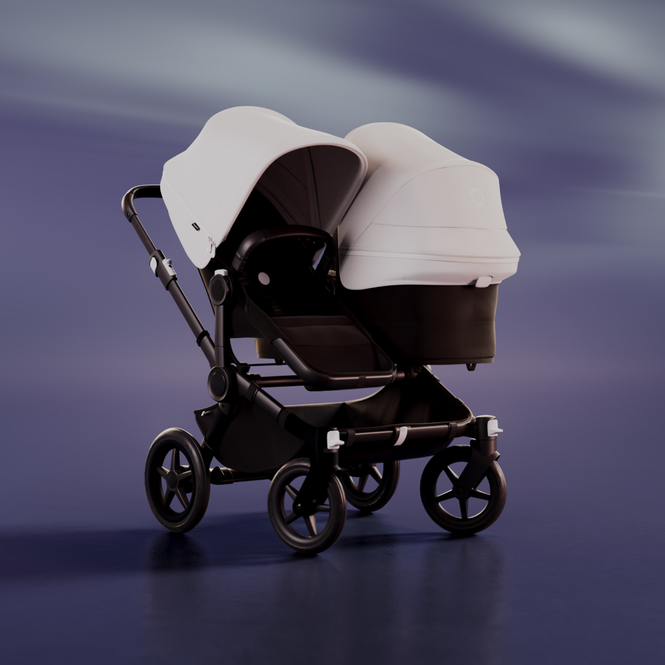 A Bugaboo Donkey 5 Duo pushchair with a seat and a carrycot. The sun canopy is in Misty White. The background is blue with streaks of white.