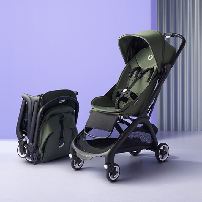 Two Bugaboo Butterfly strollers, one neatly folded, the other fully open.