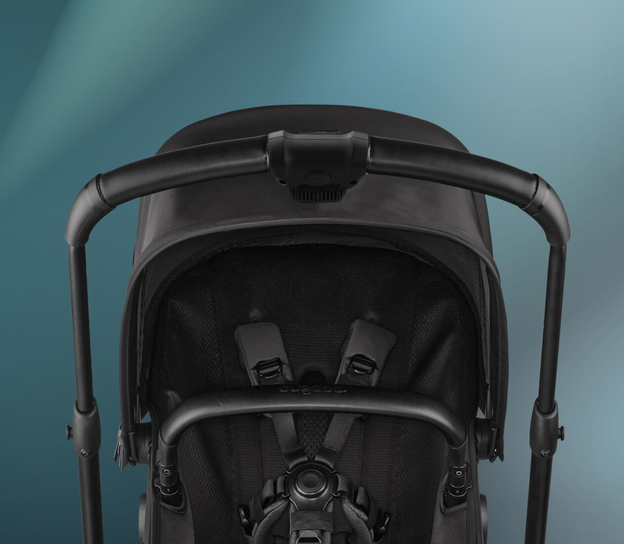 Close-up on the Bugaboo Fox 5 Noir Limited Edition Black Moonlight: Handlebar, sun canopy, and seat with harness.