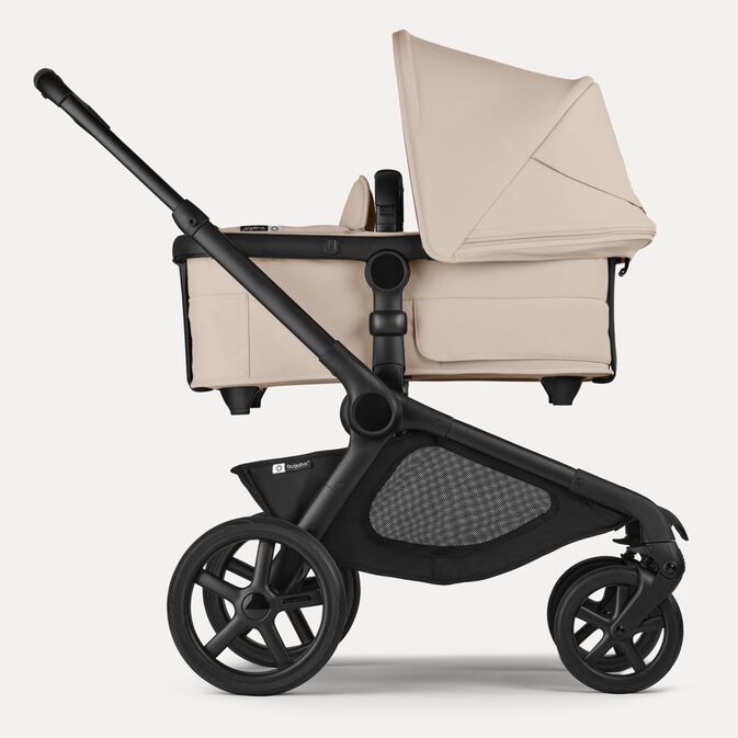 A Bugaboo Kangaroo single-to-double pram in Desert Taupe fabrics, with a bassinet.