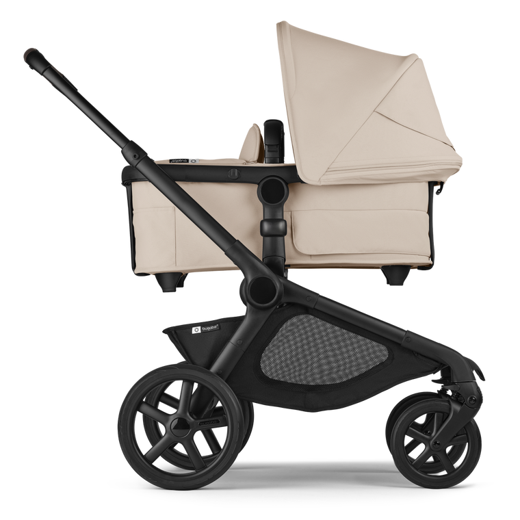 A Bugaboo Kangaroo single-to-double stroller in Desert Taupe fabrics, with a bassinet.