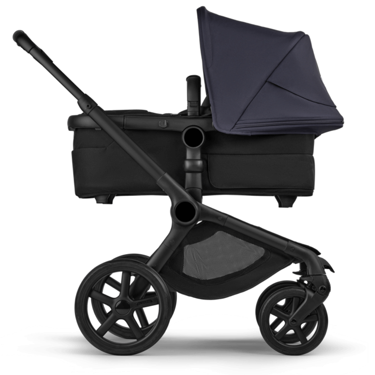 A Bugaboo Fox 5 Renew bassinet stroller in Deep Indigo colorway.